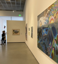 View of the gallery with paintings on the wall from the 'Young, Gifted and Black' exhibition.