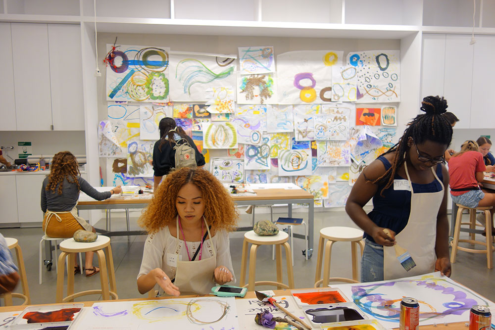 Students working on art in the museum's art studio.