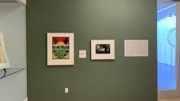 Artwork on a green wall in the museum.