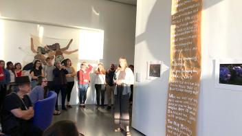 People viewing art in the museum.