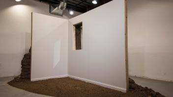 Vacant Home 2020 Adobe bricks made by hand in La Florida, CO; Soil from a suburban backyard; Concrete; Dimensional lumber; Gypsum board; Sherwin Williams “Agreeable Grey” house paint; Fiberglass insulation; Baseboard molding.  12’L x 6’W x 8’H.