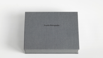 Black and white photo of a box that says 'Possible Bibliography'. 