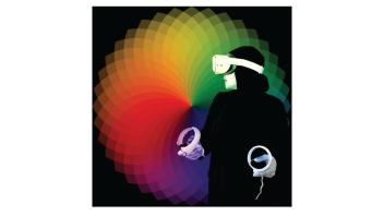 Person wearing a virtual reality headset with a color wheel behind them.