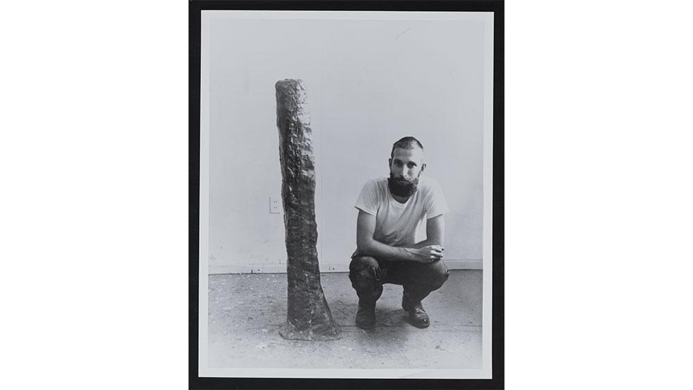 Bruce Nauman next to his first cast fiberglass piece, ca. 1965