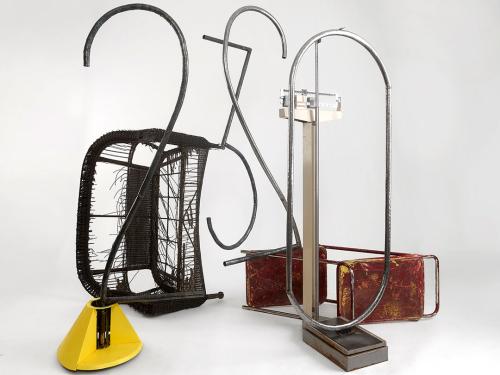 Sculpture by Khoury with various found objects and metal numbers.
