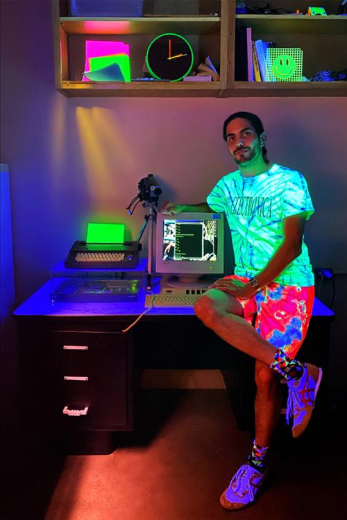 The designer, Erik Contreras, at his office of hacked objects.
