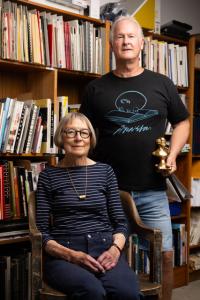 Sandra Shannonhouse and Kirk Arnseon in a room with books.
