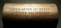 Metal time capsule by Stephen Kaltenbach that says 'Open after my death'.