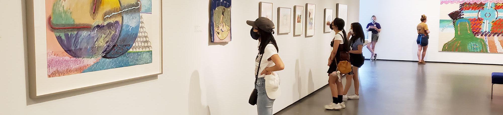 People in the galleries looking at art.
