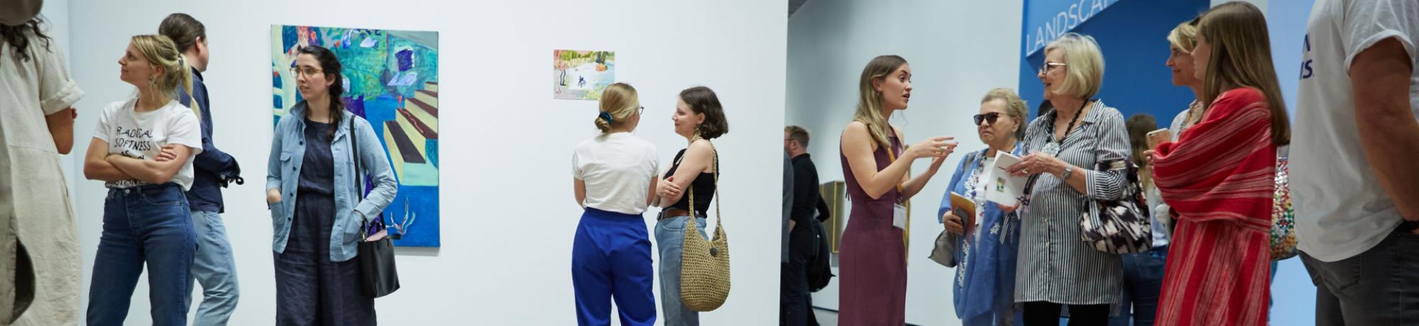 Visitors in the gallery during a past Graduate Exhibition.